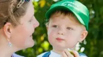 Mother holding toddler