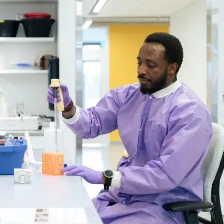 A medical student works in a lab.