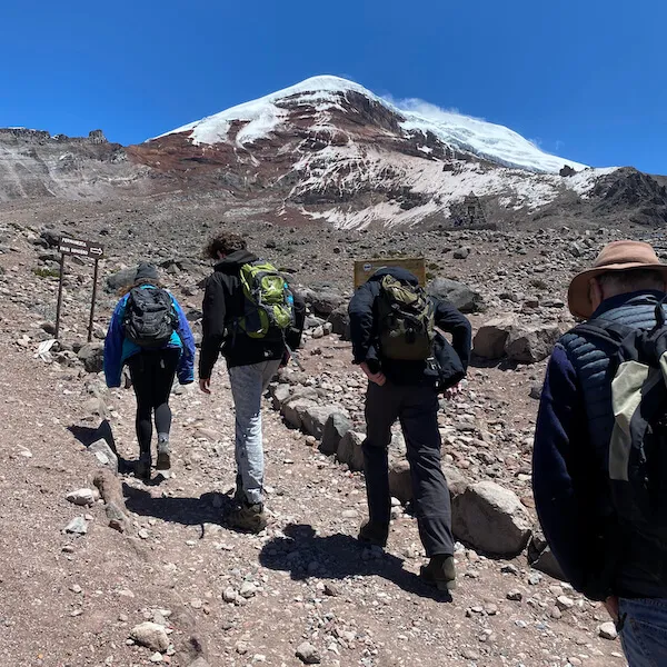 Students trek up a mountain.