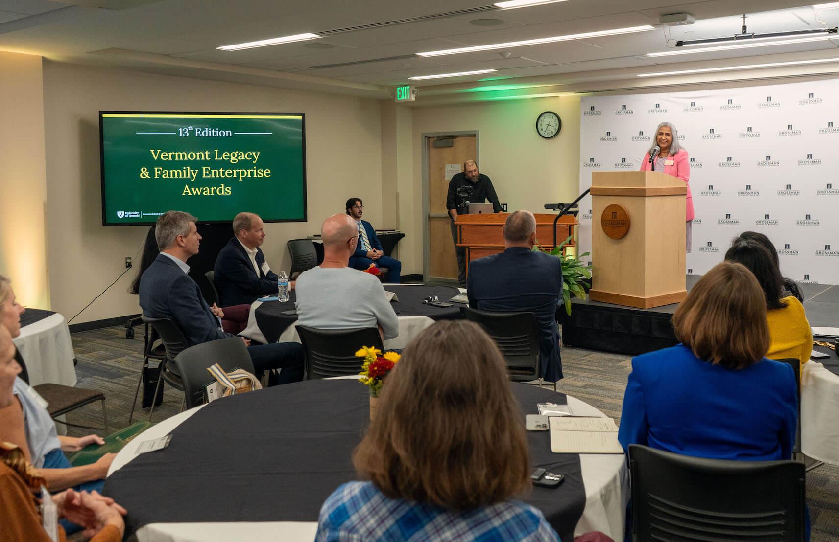 Dita Sharma addresses a crowd at the VLFEA ceremony