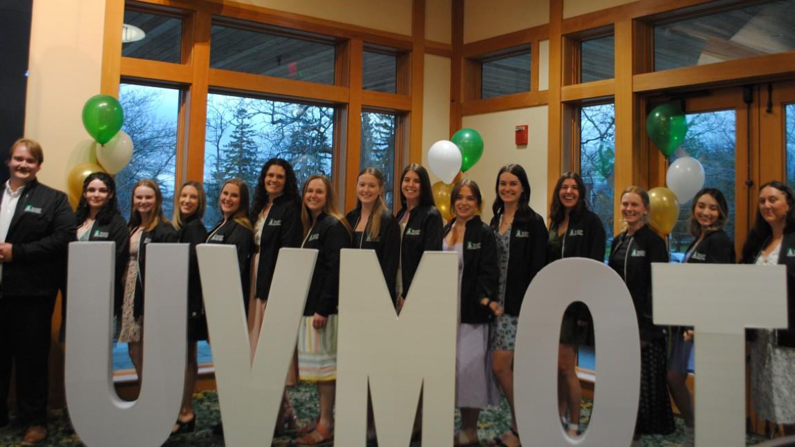 UVM occupational therapy students pose for a picture at their white coat ceremony