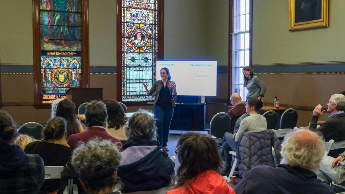 Schattman and Hammond-Wanger present in room with stained glass windows