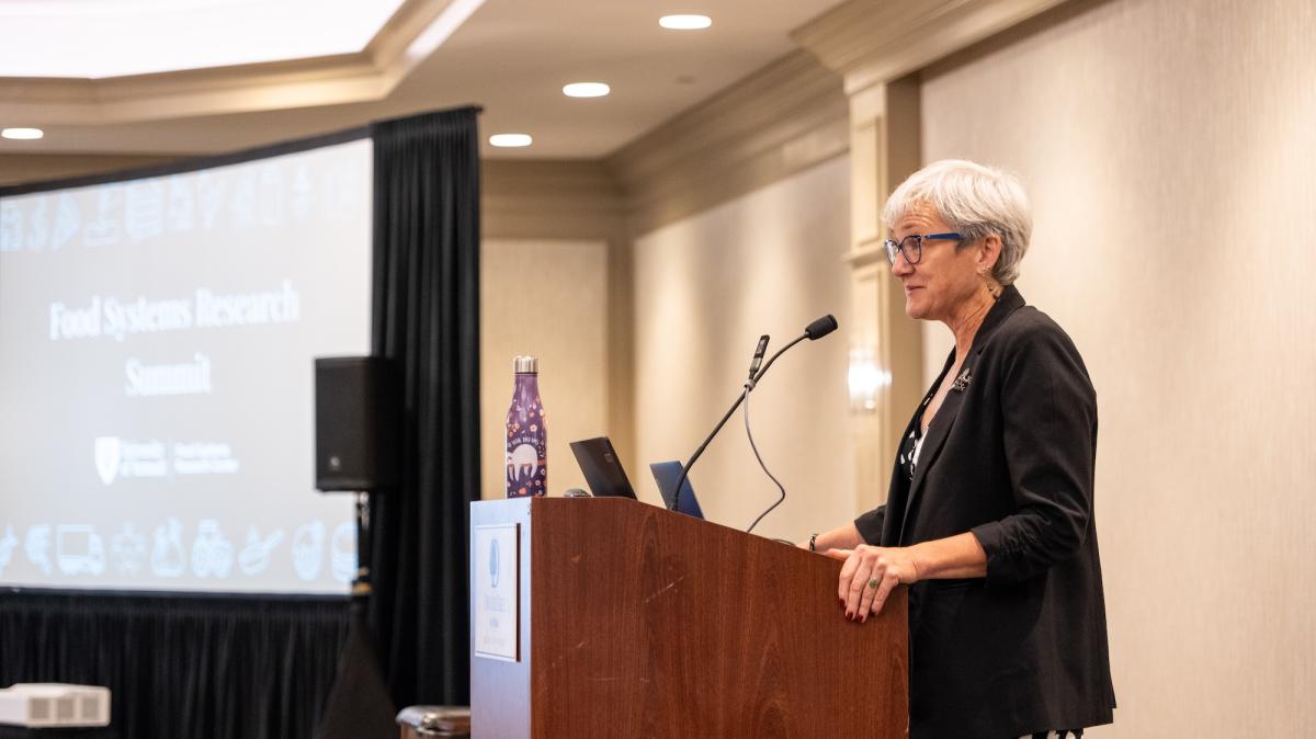 FSRC Director Polly Ericksen at a podium