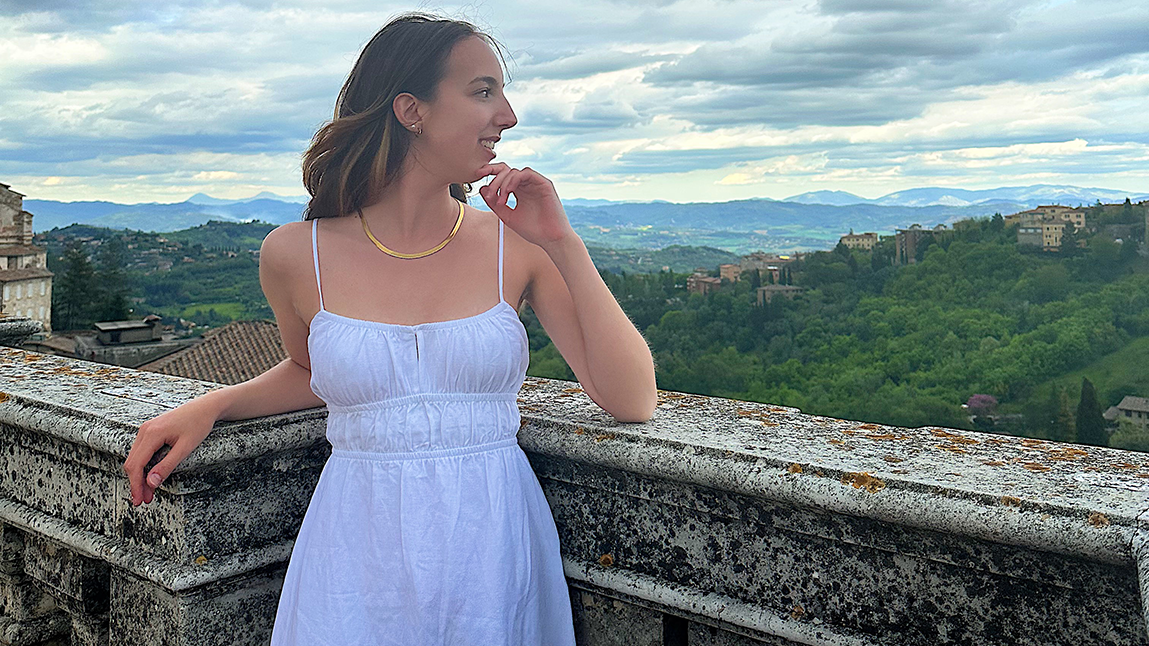 Sierra in profile looking out on the Italian landscape on a cloudy day