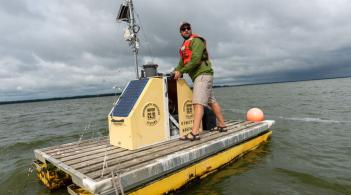 Student monitoring conditions on Lake Champlain