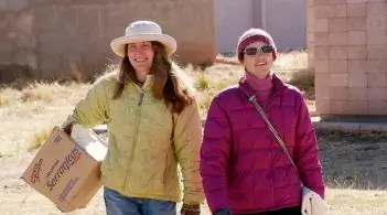 Carrying a box of food in Bolivia.