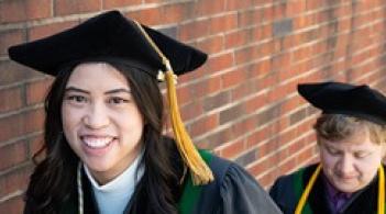 Woman in graduation regalia