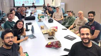 CREATE graduate students and faculty gather for a meeting