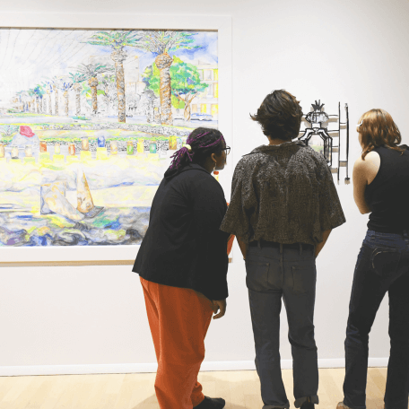 Students in the gallery viewing art