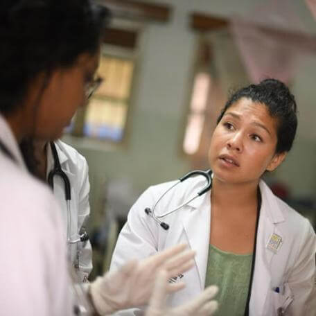 doctors in tropical clinic having a discussion