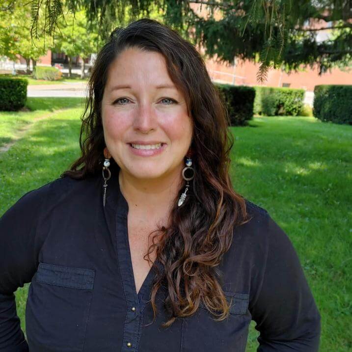 Jen Reardon standing in front of Morrill Hall