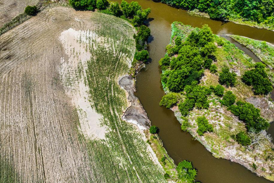 silt on the flooded fields of a farm in Johnson, Vermont