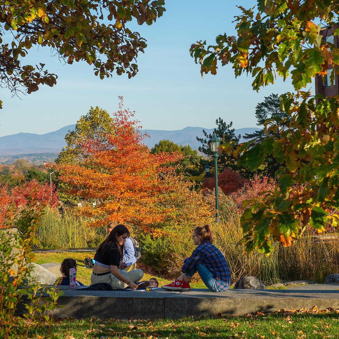 students taking a break outside on the University Heights campus dorms at UVM