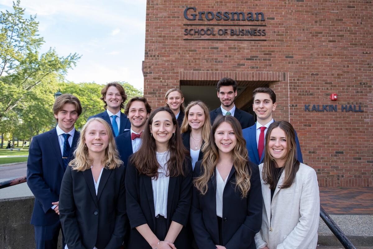 The Family Business Club poses outside of the Grossman School of Business