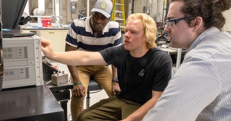 Students receive training on new equipment in the Device Characterization lab