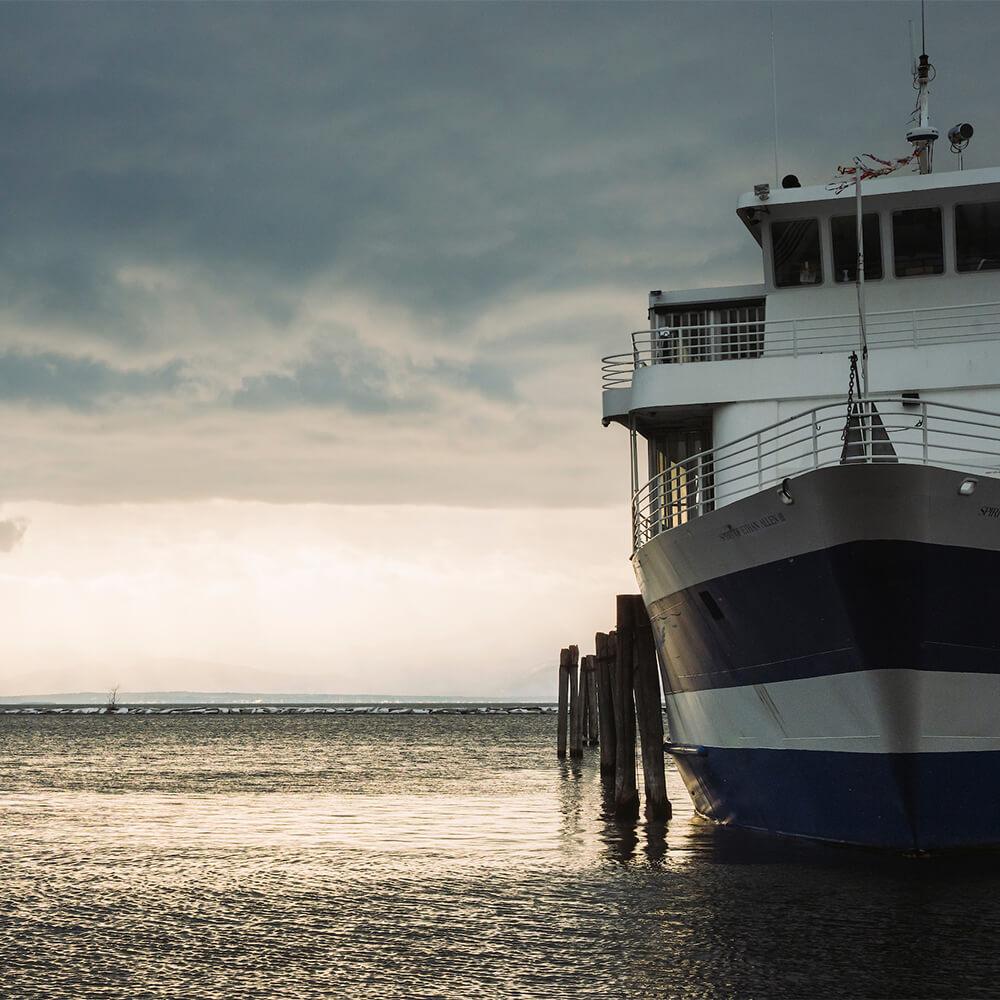 A boat on Lake Champlain at sunset