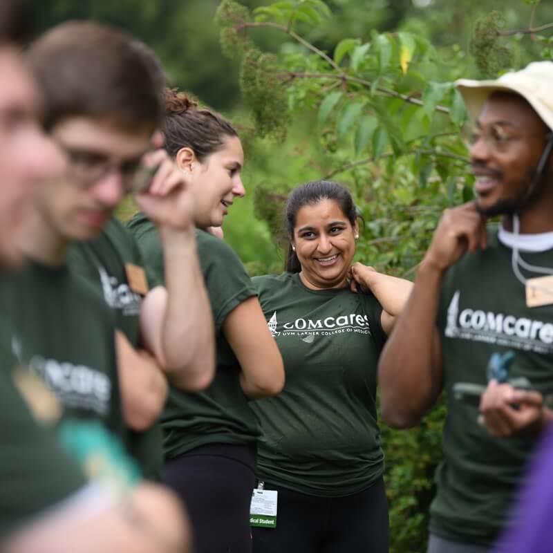 group of young people chatting and laughing