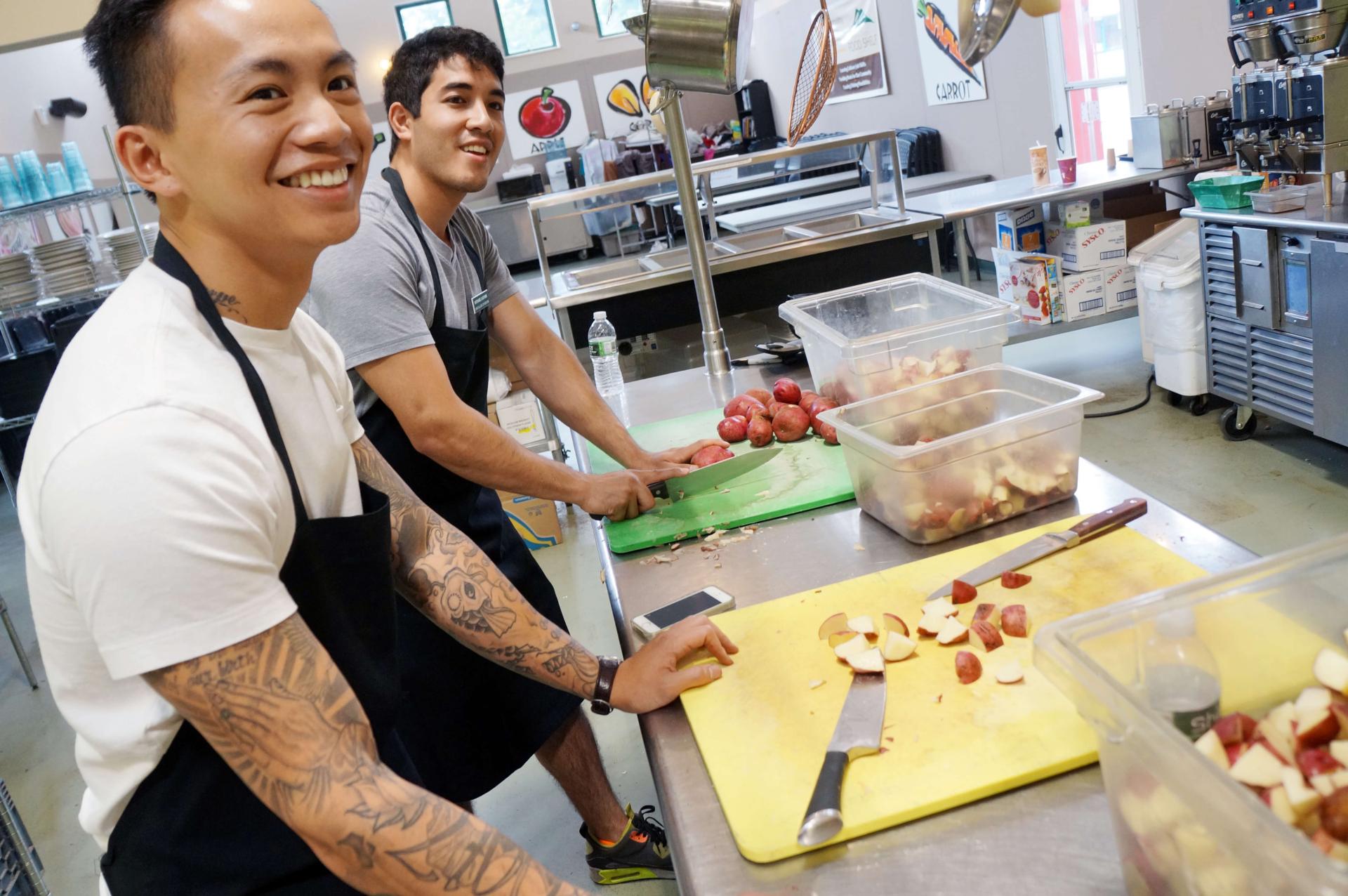 Students volunteering at a Food Shelf as part of a Wellness Orientation Activity