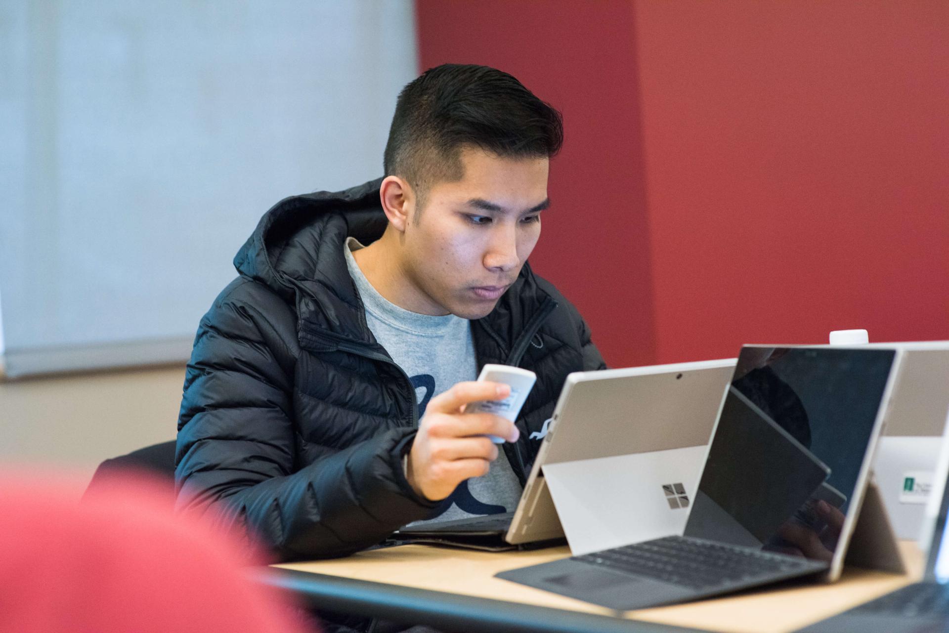 Student working at a computer.