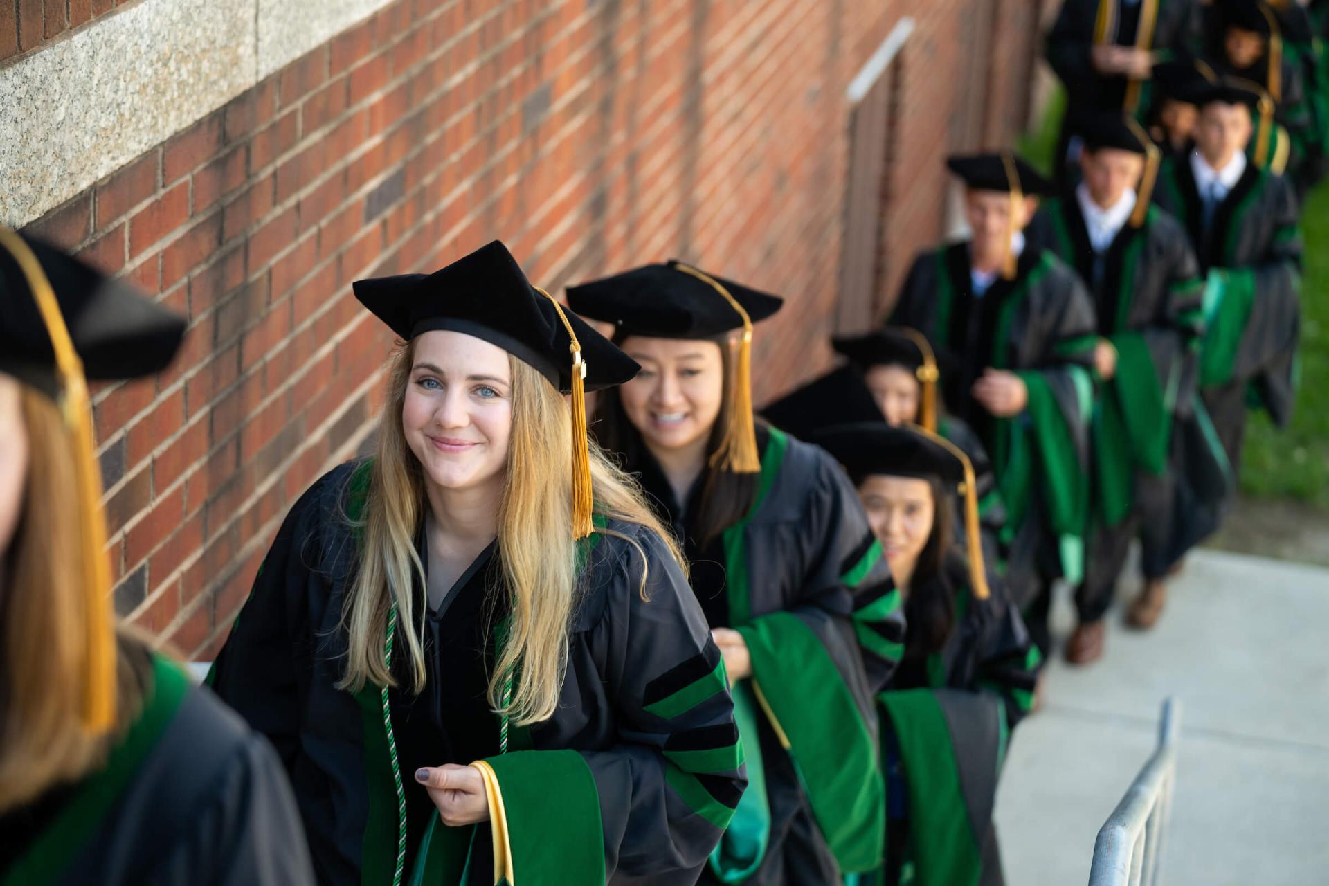 Students walking on UVM Campus during Commencement