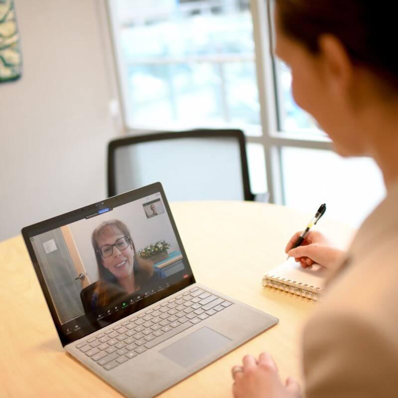 Person looking at laptop