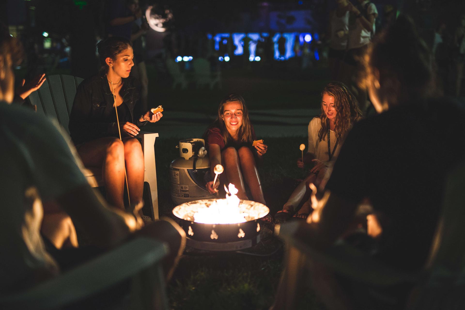 students around a bonfire