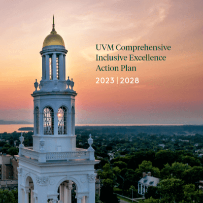 2023-2028 UVM Comprehensive Inclusive Action Plan Cover featuring the Ira Allen Chapel clock tower with the sunsetting behind it.