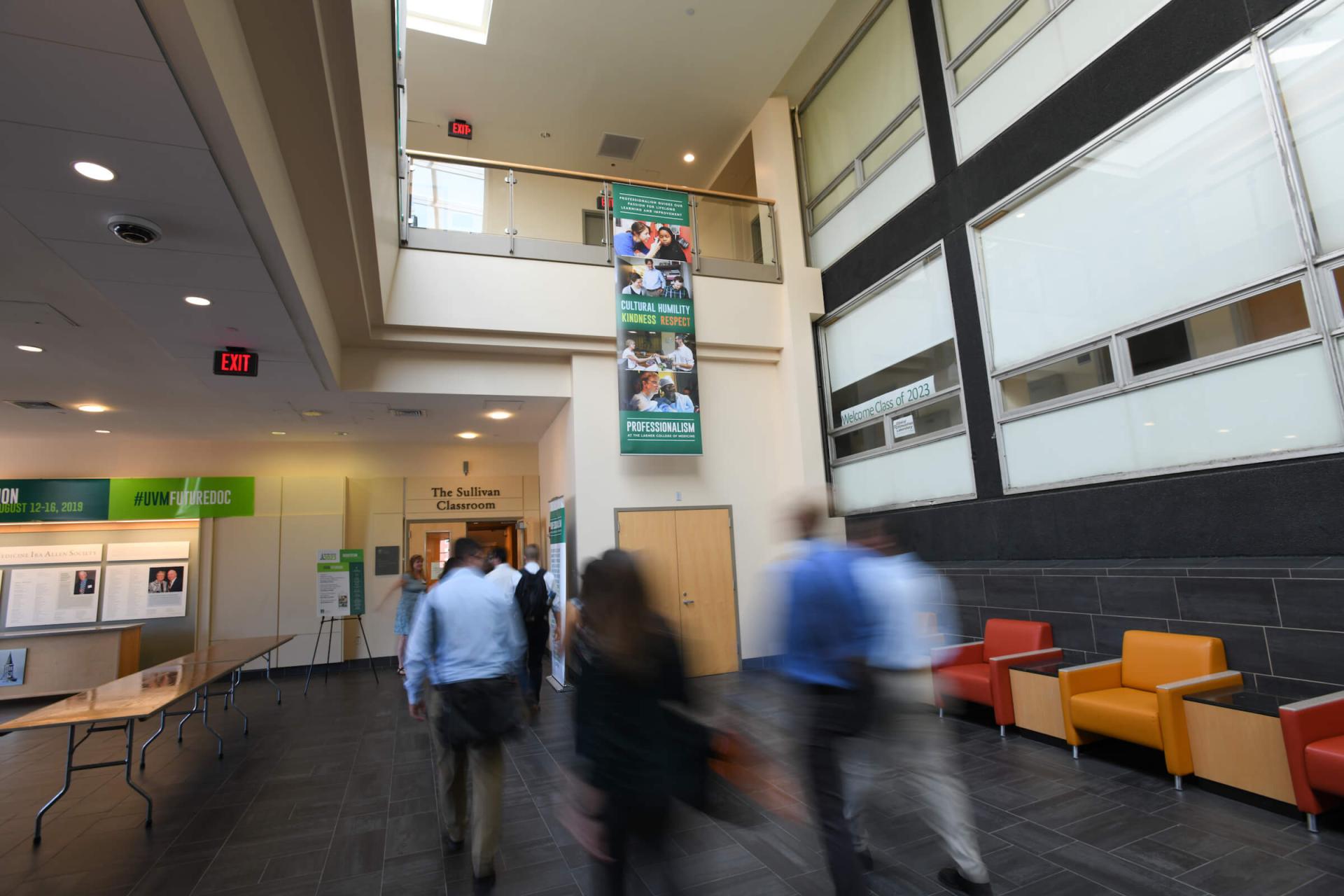 Students walking in the Given Medical Building