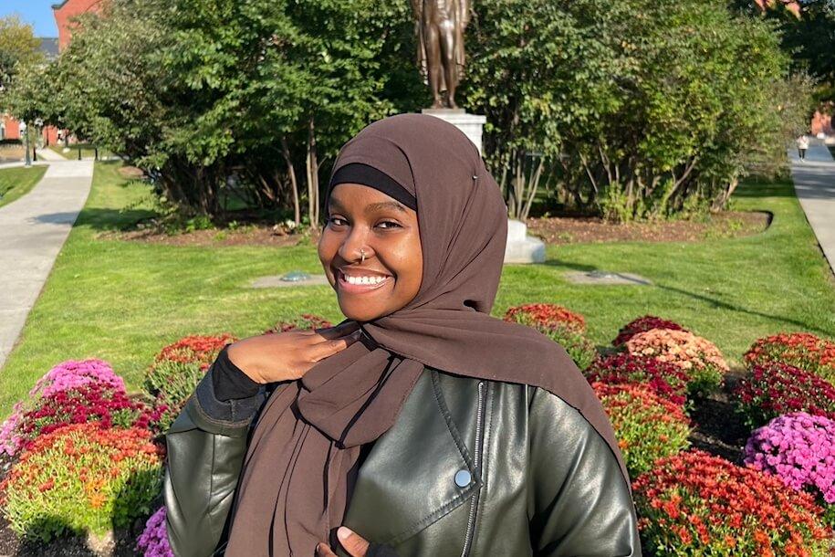 Halima Said smiling on the University Green 