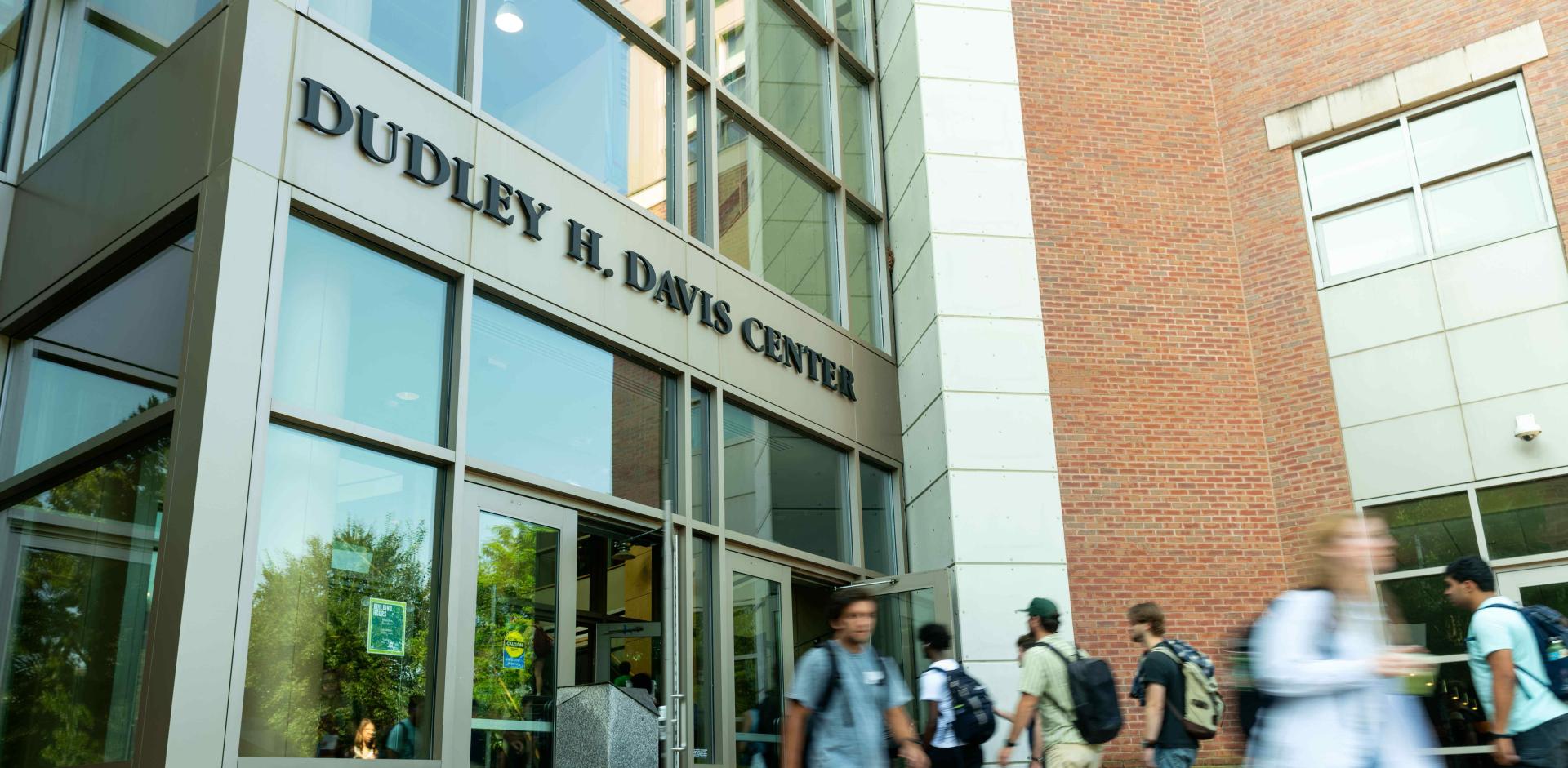 Groups of students coming from and going into the Davis Center