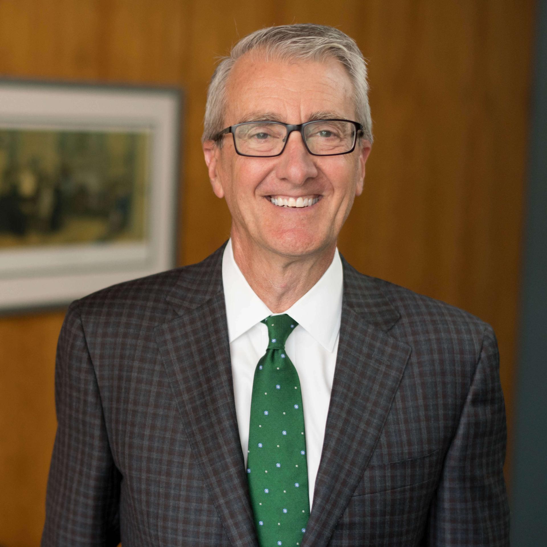 man in suit smiling