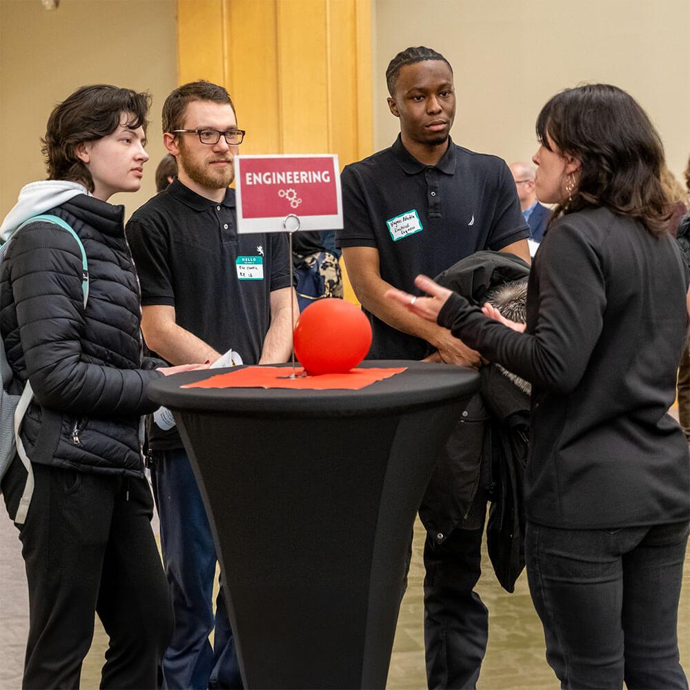 UVM students network with local company representatives during a STEM career forum