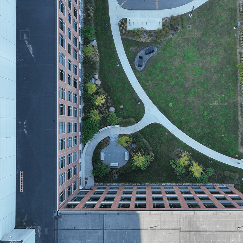 Aerial view of a building with a grid of windows. 