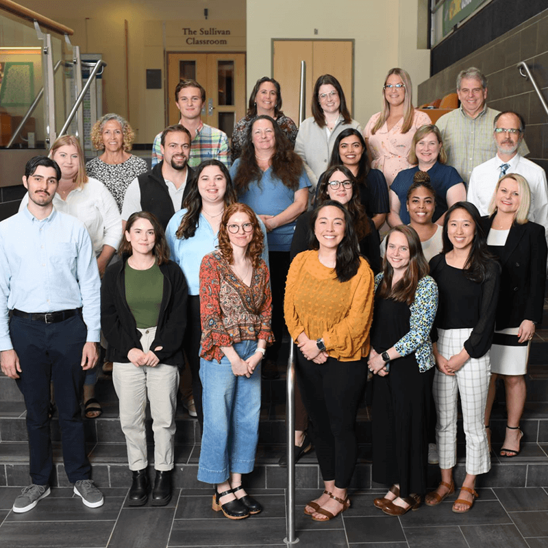 20 staff members pose for a group photo during the clinical trials office retreat.