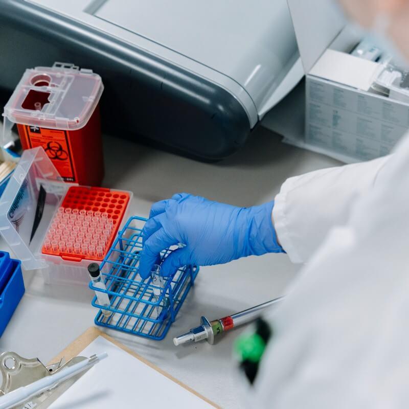 Medical laboratory scientist processing samples in lab