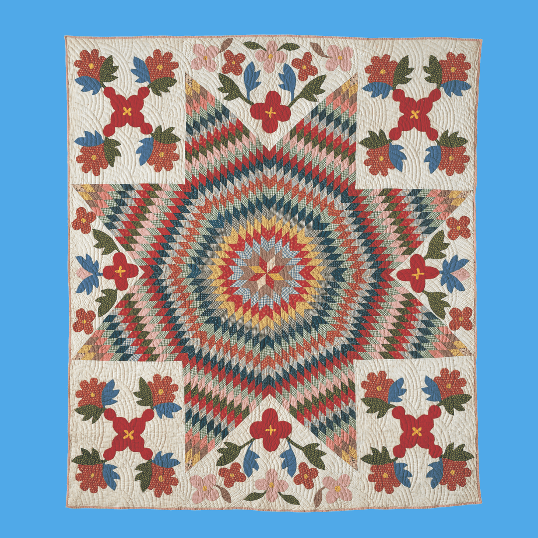 A large star pattern dominates this quilt.