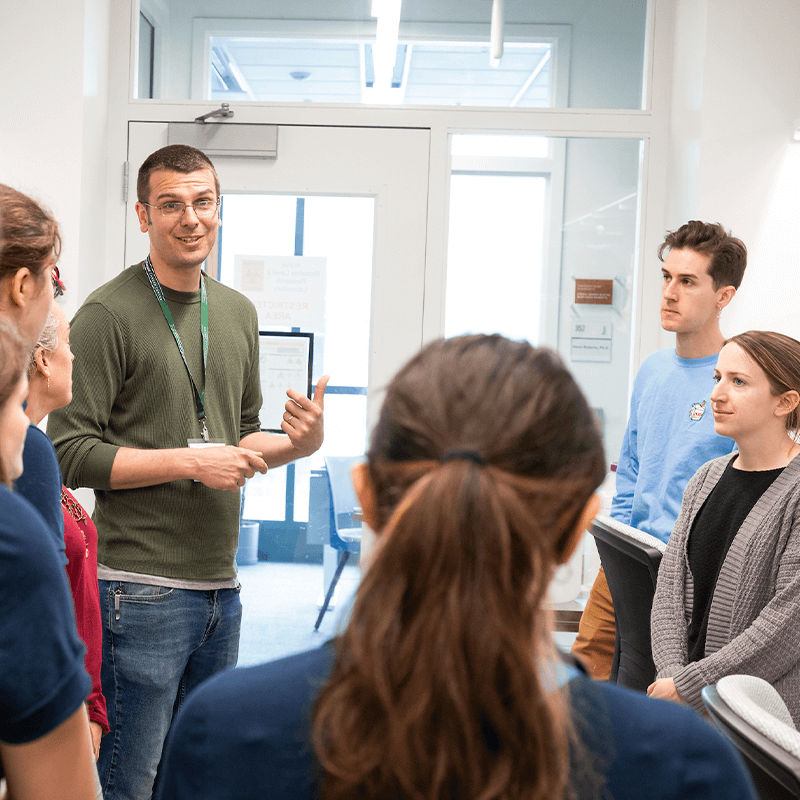 Students tour the Roberts Lab at the UVM Cancer Center.