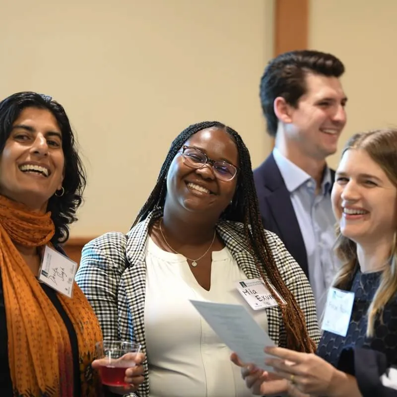 three students laughing