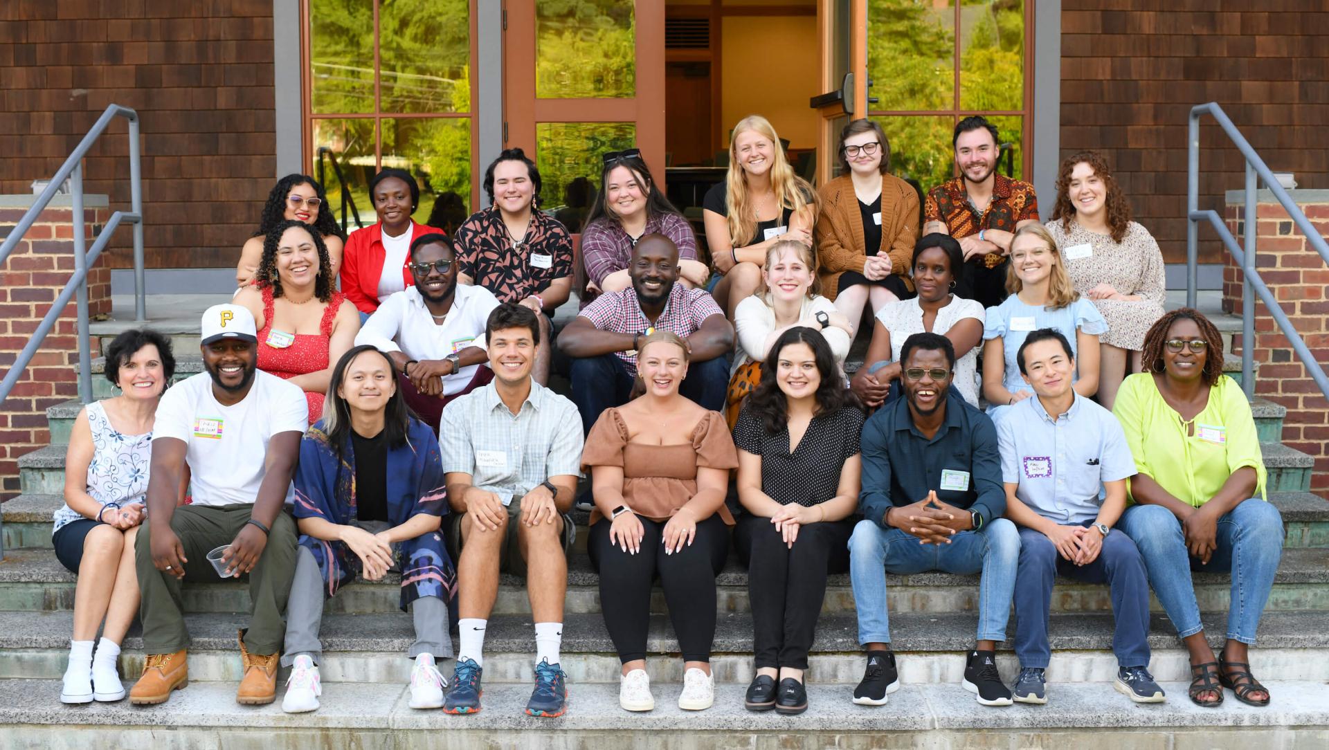 HESA students, faculty, alumni and friends together in front of the UVM Alumni House.