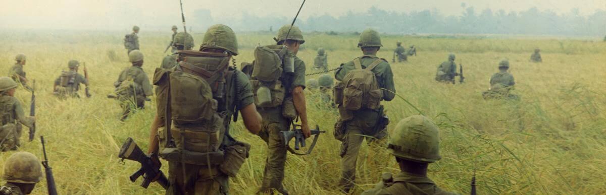 soldiers in a field in Vietnam