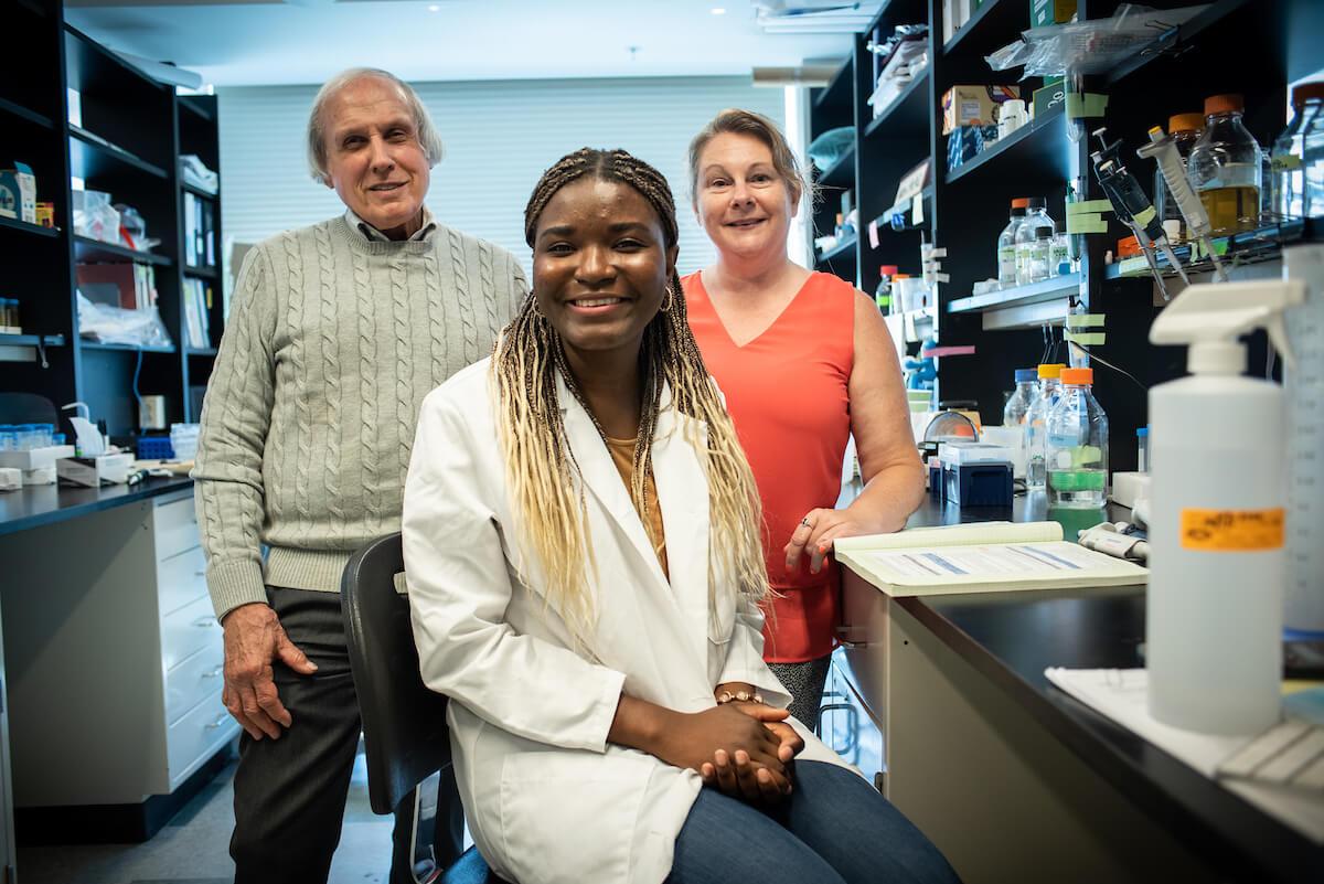 three people in a lab