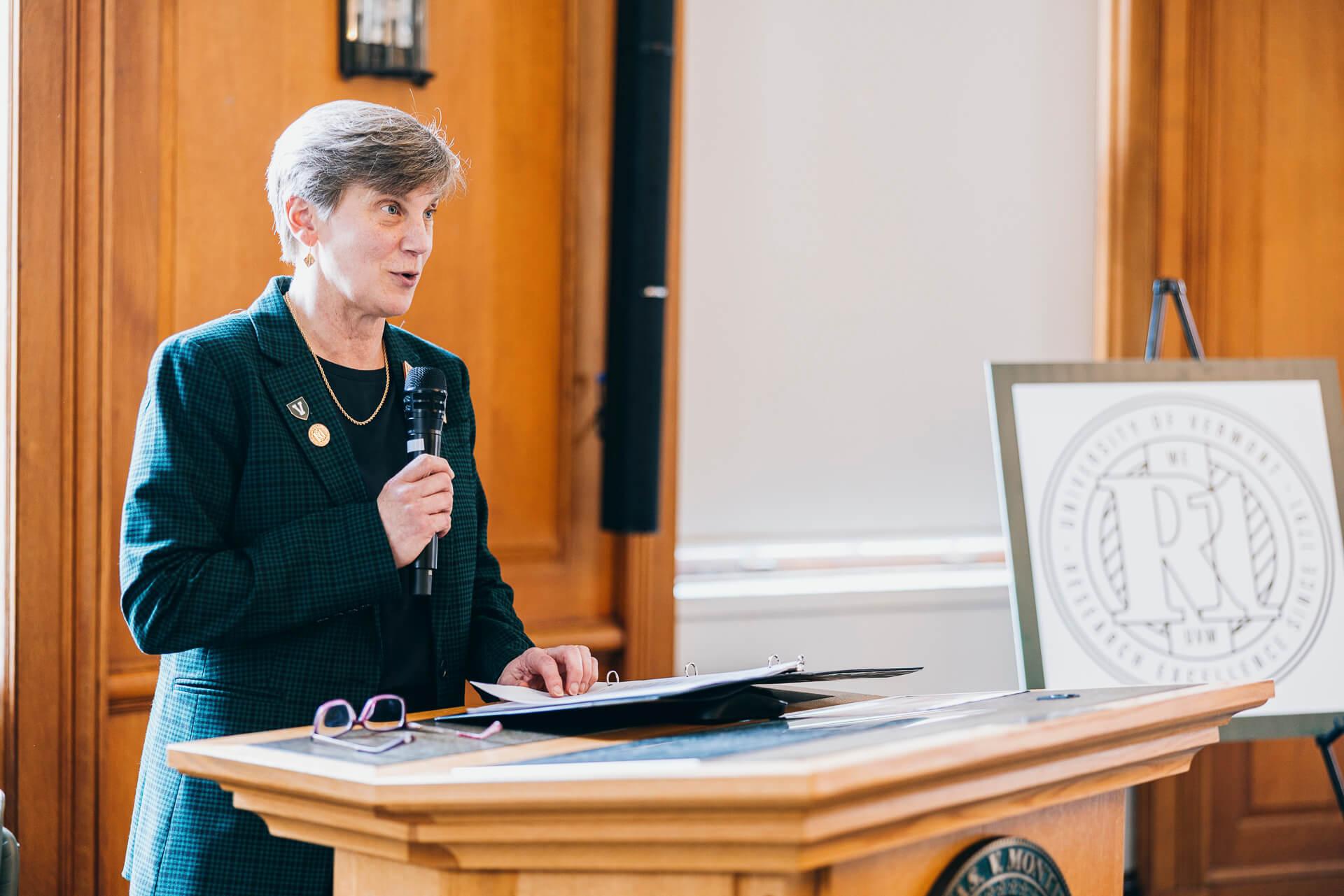 Linda Schadler delivers remarks in front of an R1 sign