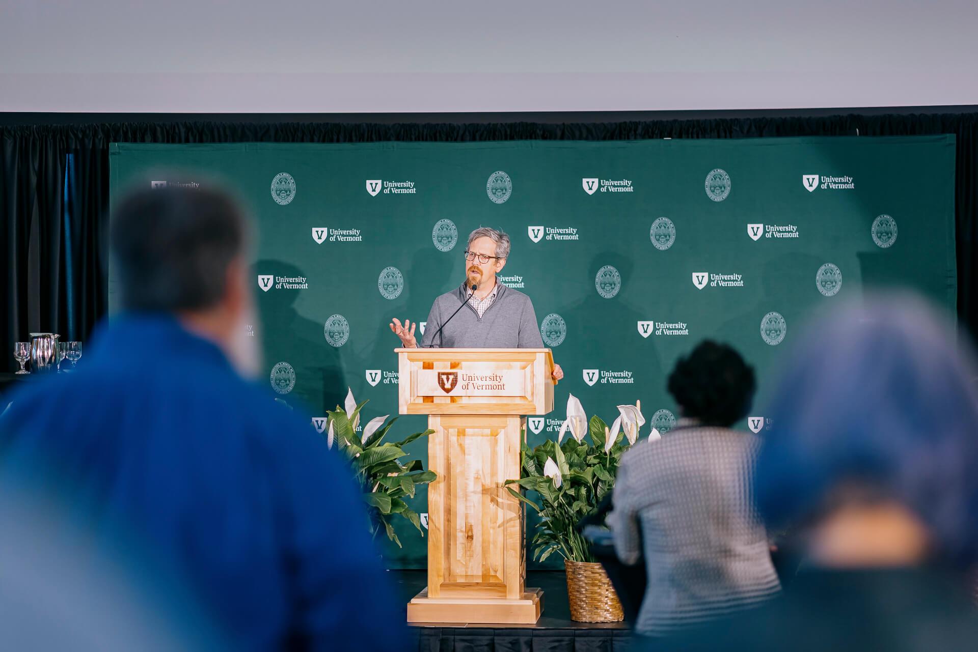 Researcher Luis Vivanco addresses a crowd