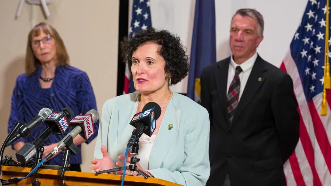 Photo of Provost Patty Prelock at governor's press conference